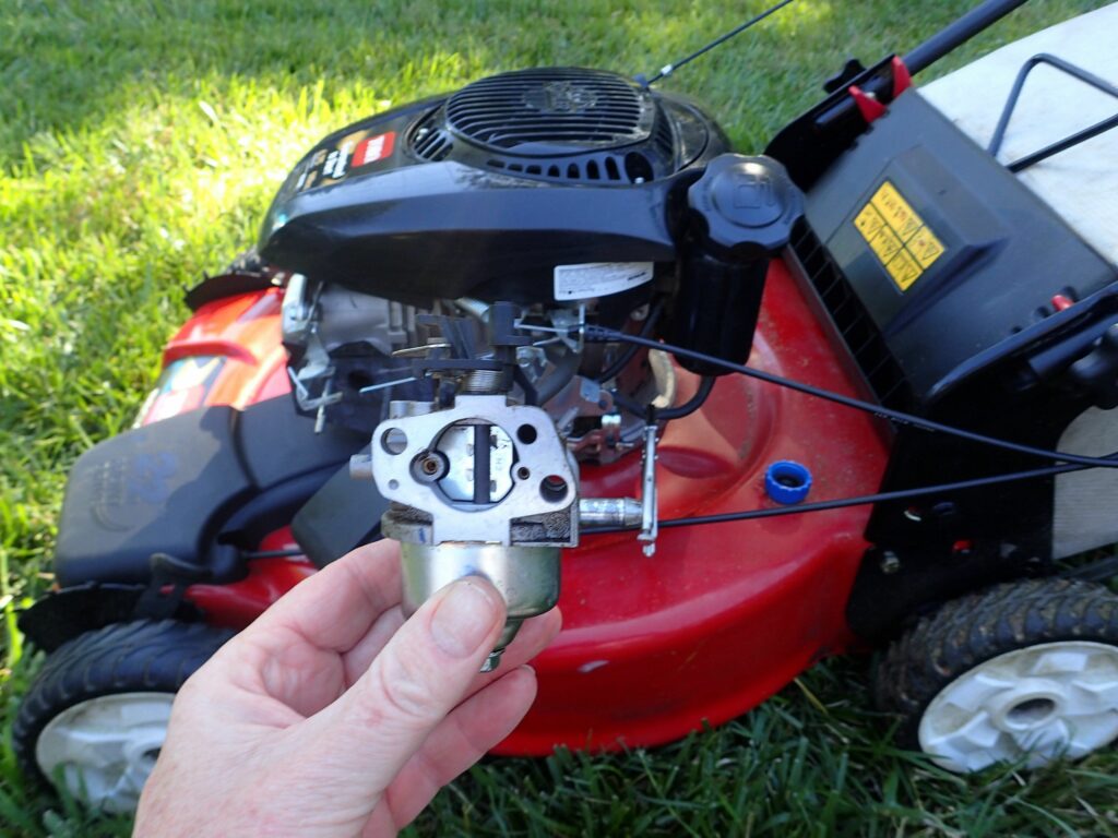 carburetor without removing it from the mower